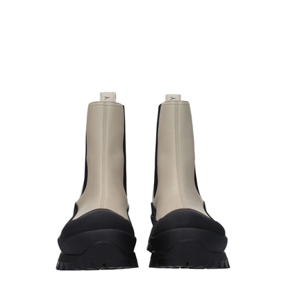 Mid-Heel Ankle Boots by Stella McCartney for women in leather & rubber black showcases a impeccable silhouette as Women's Leather & Rubber Mid-Heel Ankle Boots, artfully defined by a impeccable 5-5-cm-heel mid-heel and a impeccable round toe style.