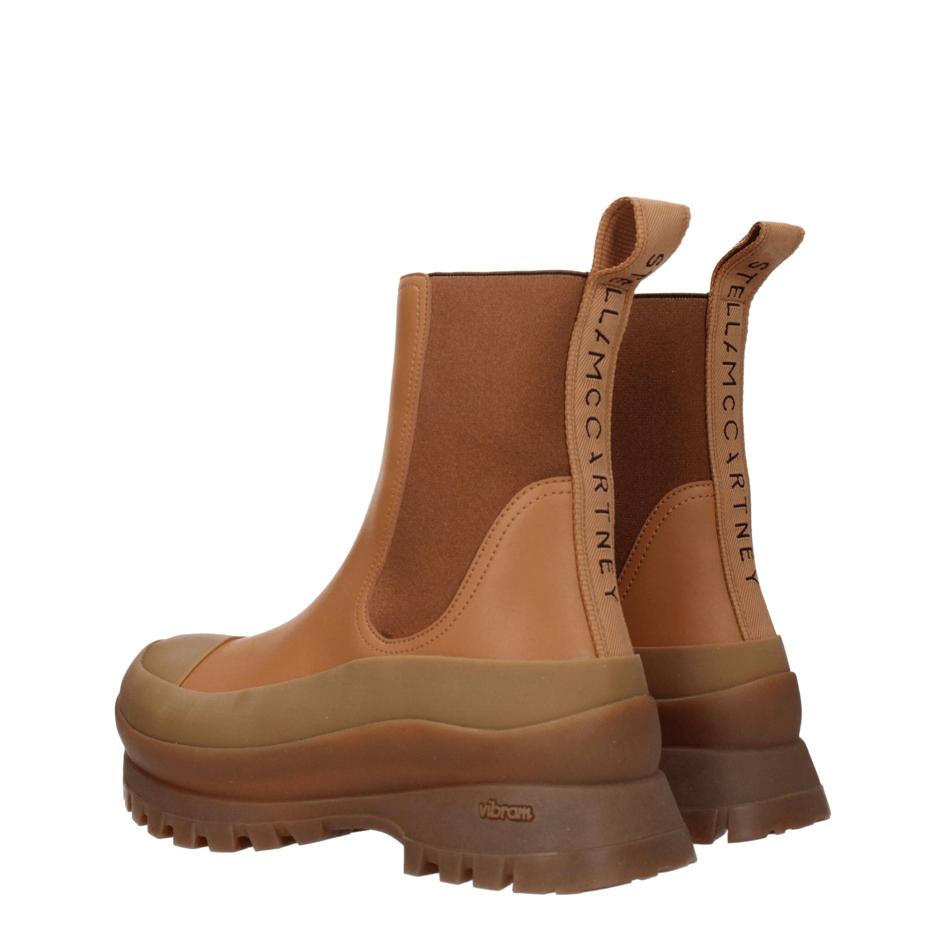 Mid-Heel Ankle Boots by Stella McCartney for women in leather & rubber brown showcases a ergonomic silhouette from the Women's Leather & Rubber Mid-Heel Ankle Boots collection, featuring a ergonomic 5-5-cm-heel mid-heel and a ergonomic round toe style.