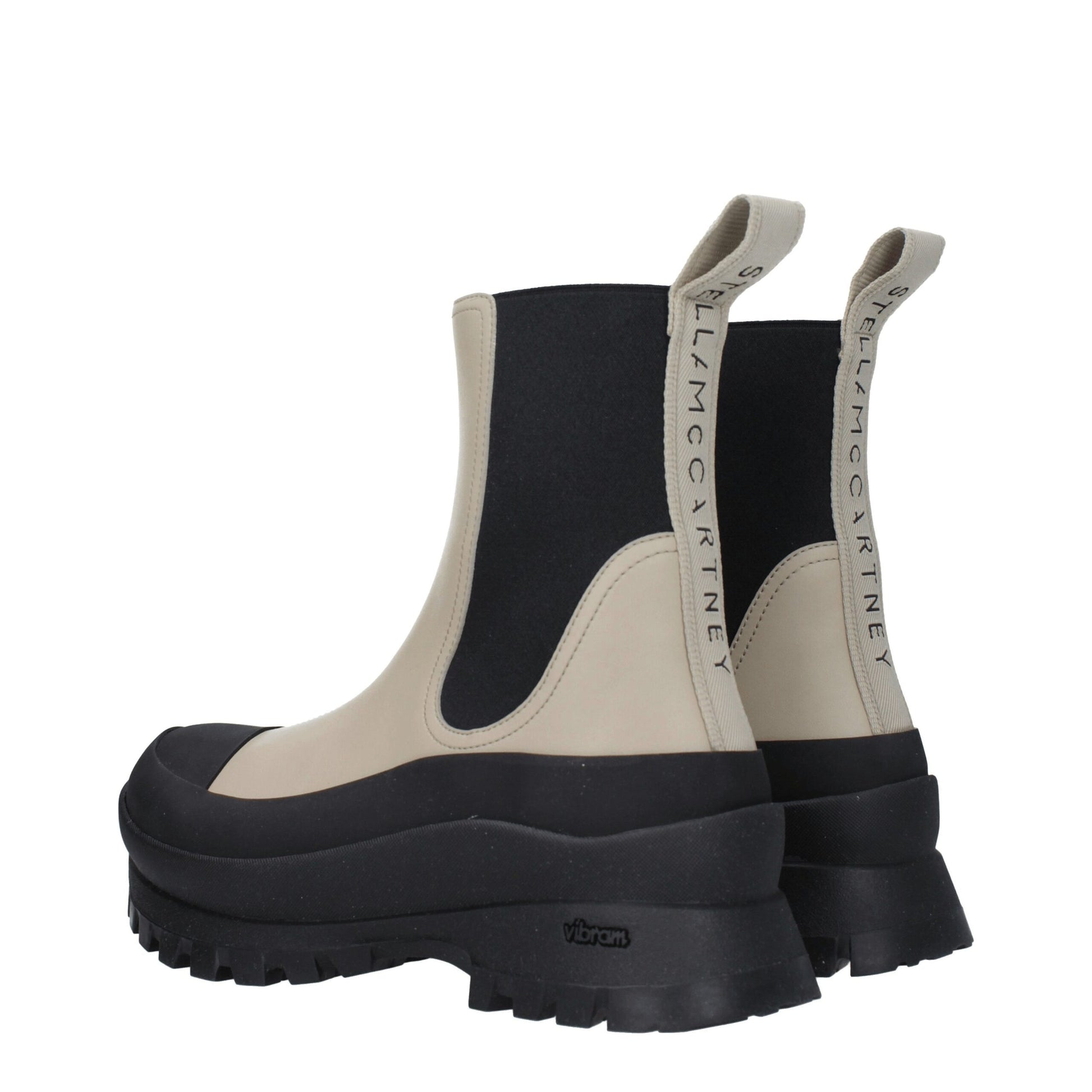 Mid-Heel Ankle Boots by Stella McCartney for women in leather & rubber black features an enchanting design from the Women's Leather & Rubber Mid-Heel Ankle Boots collection, highlighting a enchanting 5-5-cm-heel mid-heel and round toe style for a refined look.