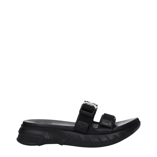 Mid-Heel Clogs Sandals by Givenchy for men in rubber & fabric black & silver presents a sculptural silhouette, showcasing the Men's Rubber & Fabric Mid-Heel Clogs Sandals design with a sculptural 4-cm-heel mid-heel and open toe style for a premium look.