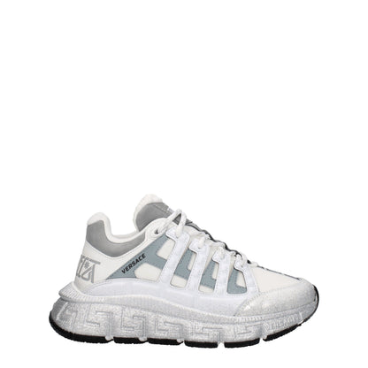 Athletic Sneakers by Versace for women in leather silver & white features an exquisite silhouette, showcasing the premium athletic style of the Women's Athletic Leather Sneakers with an exquisite finish.