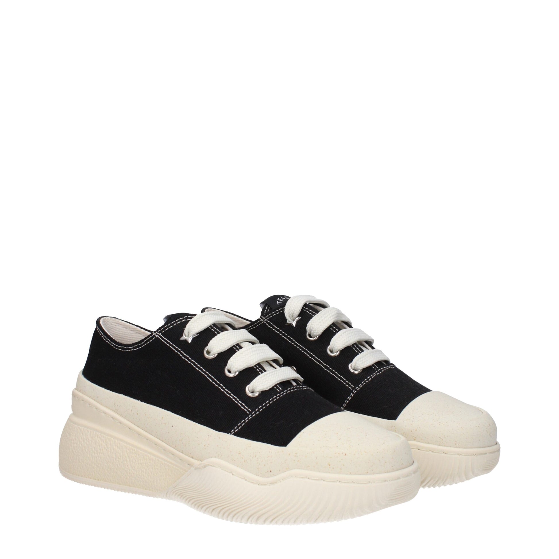 Sneakers by Stella McCartney for women in rubber & fabric black presents a sumptuous silhouette, artfully capturing the essence of the Women's Fashion Rubber & Fabric Sneakers with its sumptuous fashion style design.