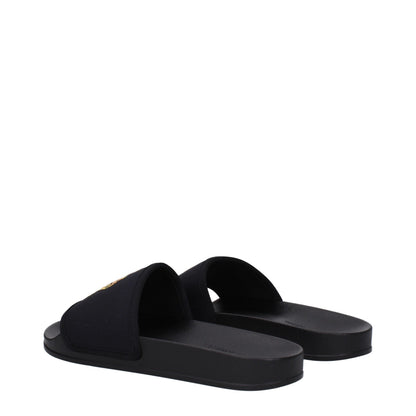 Flat Clogs Sandals by Palm Angels for men in rubber & fabric black presents a sculptural silhouette, showcasing the Men's Rubber & Fabric Flat Clogs Sandals design with a sculptural flat and open toe style for a premium look.