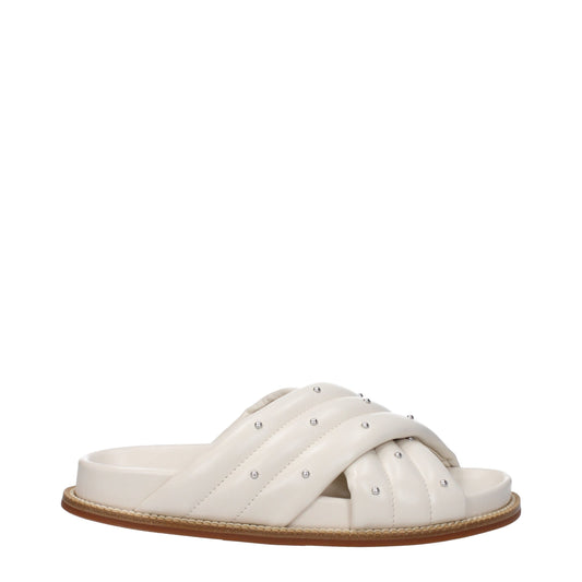 Flat Clogs Sandals by Fabiana Filippi for women in leather & rubber beige & ivory showcases a sculptural silhouette as Women's Leather & Rubber Flat Clogs Sandals, defined by a sculptural flat and sculptural open toe style for a sculptural look.