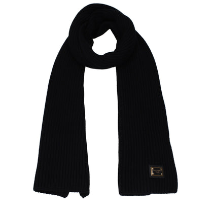 Scarf by Dolce & Gabbana for men in cashmere black presents a cosy silhouette, artfully capturing the sophisticated design and premium aesthetic of the Cashmere Scarf.