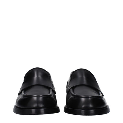 Flat Loafer Shoes by Dolce & Gabbana for men in leather black showcases a resplendent Men's Leather Flat Loafer Shoes aesthetic, defined by its resplendent round toe style and elegant flat.