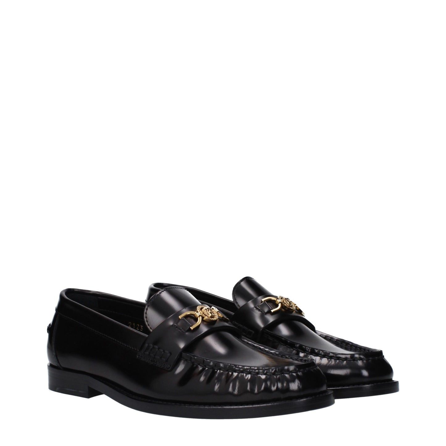 Flat Loafer Slip-On Shoes by Versace for women in leather black features an dynamic silhouette from the Women's Leather Flat Loafer Slip-On Shoes collection, defined by a dynamic round toe style and flat for a dynamic look.
