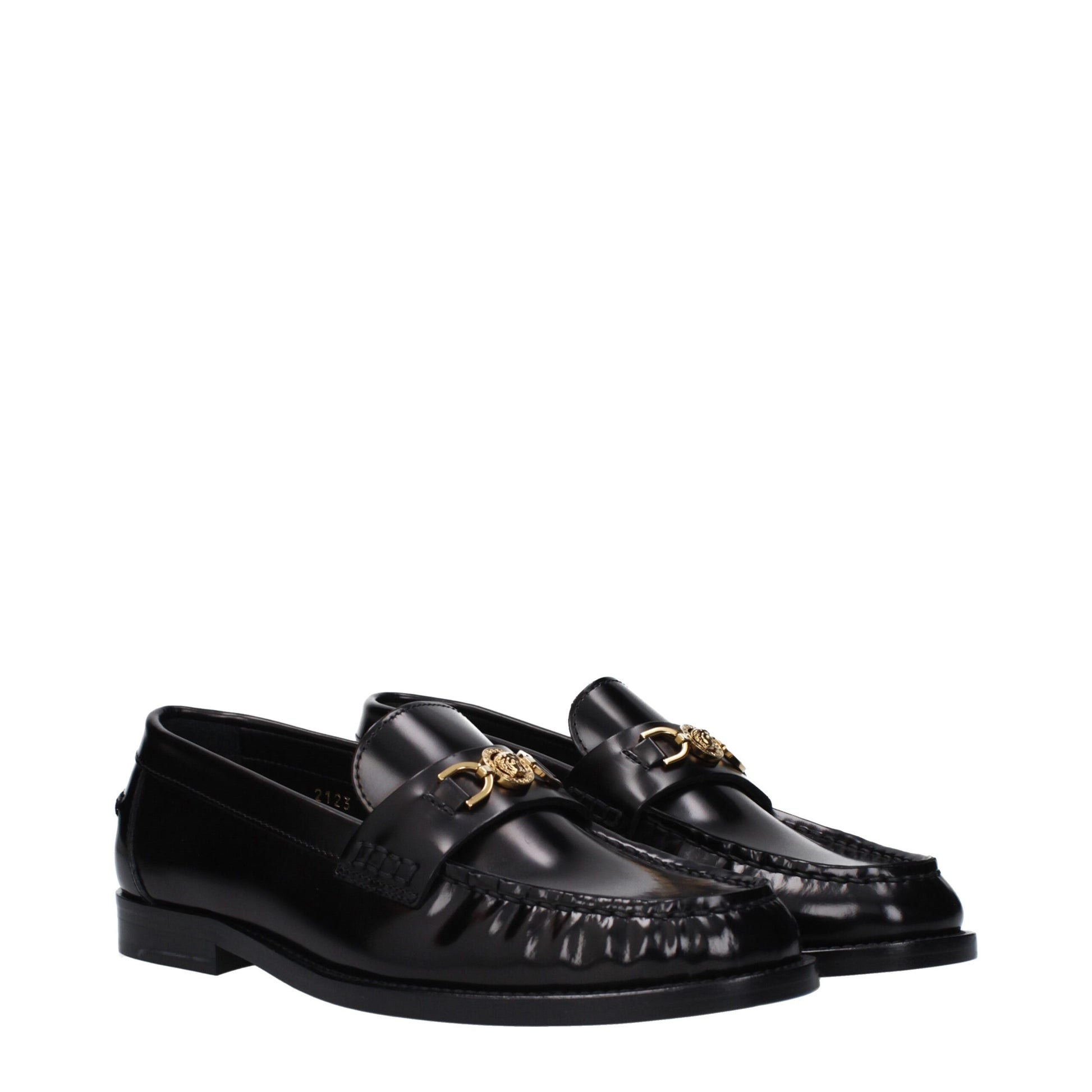 Flat Loafer Slip-On Shoes by Versace for women in leather black features an dynamic silhouette from the Women's Leather Flat Loafer Slip-On Shoes collection, defined by a dynamic round toe style and flat for a dynamic look.