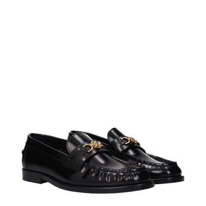 Flat Loafer Slip-On Shoes by Versace for women in leather black features an dynamic silhouette from the Women's Leather Flat Loafer Slip-On Shoes collection, defined by a dynamic round toe style and flat for a dynamic look.
