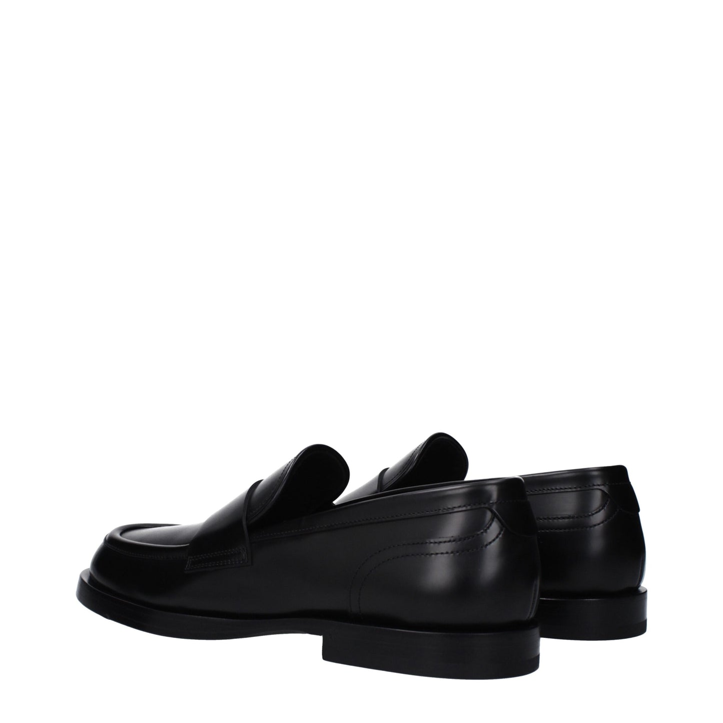 Flat Loafer Shoes by Dolce & Gabbana for men in leather black showcases a timeless silhouette from the Men's Leather Flat Loafer Shoes collection, featuring a timeless flat and round toe style for a timeless finish.