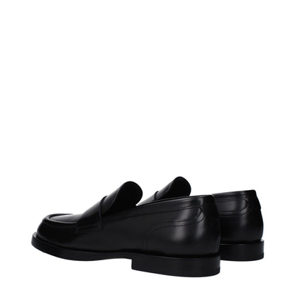 Flat Loafer Shoes by Dolce & Gabbana for men in leather black showcases a timeless silhouette from the Men's Leather Flat Loafer Shoes collection, featuring a timeless flat and round toe style for a timeless finish.