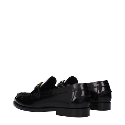 Flat Loafer Slip-On Shoes by Versace for women in leather black features an dynamic silhouette from the Women's Leather Flat Loafer Slip-On Shoes collection, defined by a dynamic round toe style and flat for a dynamic look.