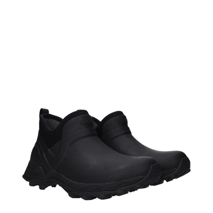 Flat Ankle Boots by Givenchy for men in cotton & rubber black features an high-performance silhouette, showcasing the sophisticated design of the Men's Cotton & Rubber Flat Ankle Boots with a flat and a refined round toe style.