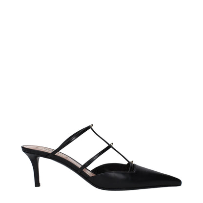 Mid-Heel Sandals by Valentino Garavani for women in leather and black & gold presents a captivating silhouette, showcasing the signature style of the Women's Leather Mid-Heel Sandals with a captivating 6-5-cm-heel mid-heel and captivating .