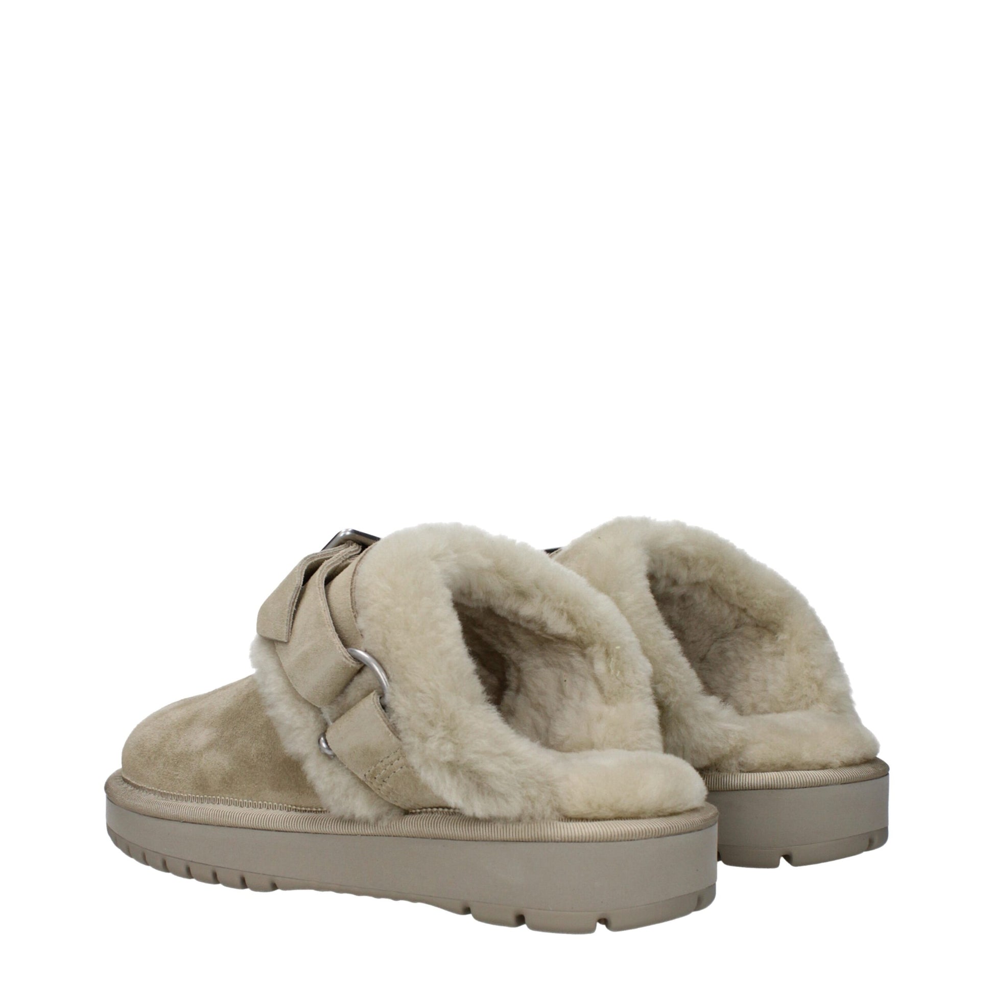 Flat Clogs Sandals by Burberry for women in suede leather & fur green features an exquisite silhouette, showcasing the exquisite Hunter Women's Suede Leather & Fur Flat Clogs Sandals with a flat and round toe style.