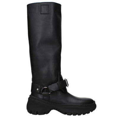 Mid-Heel Boots by Burberry for women in leather & rubber black & silver showcases a impeccable silhouette as Women's Leather & Rubber Mid-Heel Boots, artfully defined by a impeccable 5-cm-heel mid-heel and a impeccable round toe style.
