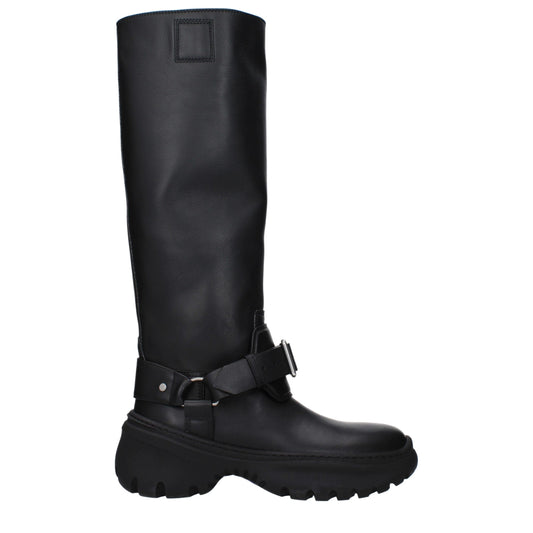 Mid-Heel Boots by Burberry for women in leather & rubber black & silver showcases a impeccable silhouette as Women's Leather & Rubber Mid-Heel Boots, artfully defined by a impeccable 5-cm-heel mid-heel and a impeccable round toe style.
