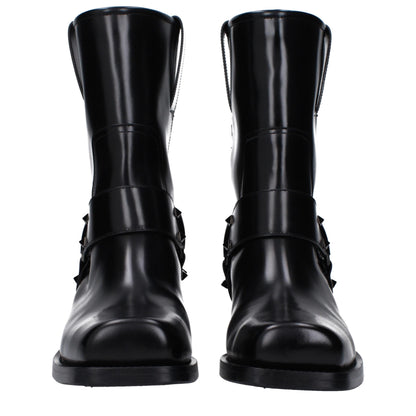 Mid-Heel Ankle Boots by Valentino Garavani for women in leather black features an high-performance silhouette, showcasing the sophisticated design of the Women's Leather Mid-Heel Ankle Boots with a 4-5-cm-heel mid-heel and a refined square toe style.