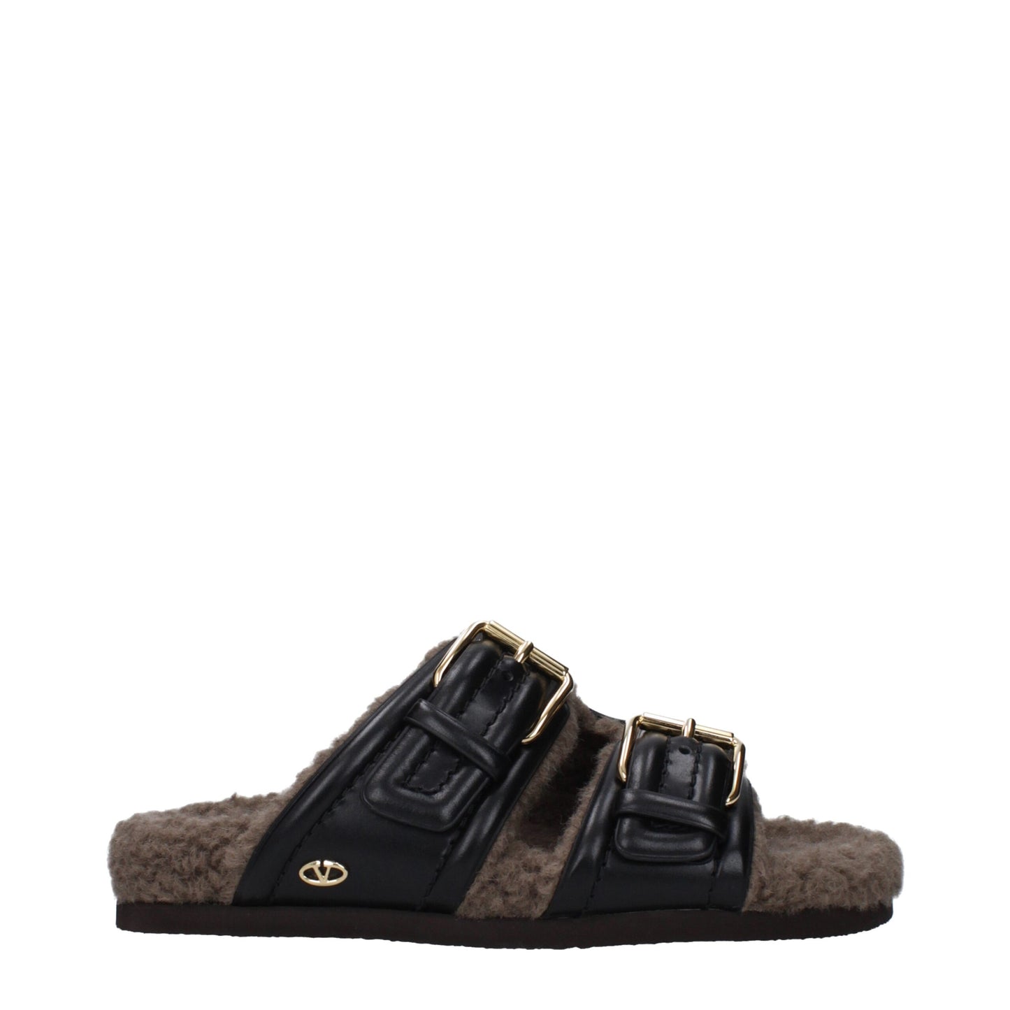 Flat Clogs Slippers by Valentino Garavani for women in leather & rubber black features an timeless Women's Leather & Rubber Flat Clogs Slippers aesthetic, defined by a flat and a refined open toe style.