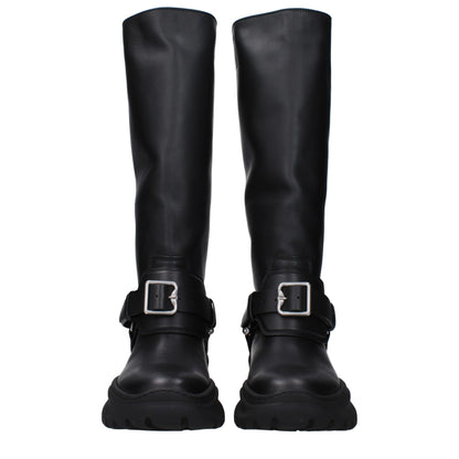 Mid-Heel Boots by Burberry for women in leather & rubber black & silver features an dynamic silhouette, showcasing the dynamic Women's Leather & Rubber Mid-Heel Boots design with its distinctive 5-cm-heel mid-heel and elegant round toe style.