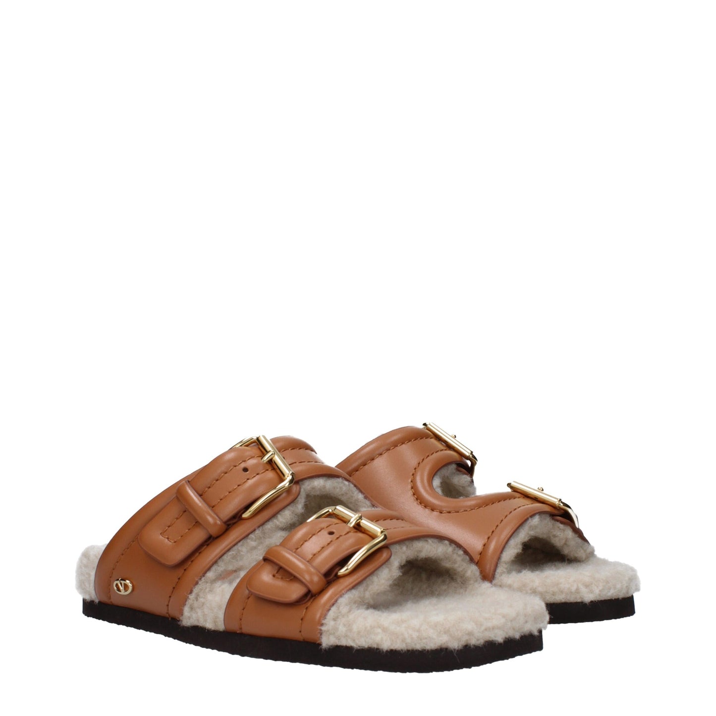 Flat Clogs Sandals by Valentino Garavani for women in leather & rubber and brown presents a captivating silhouette, showcasing the signature style of the Women's Leather & Rubber Flat Clogs Sandals with a captivating flat and captivating almond open toe style.