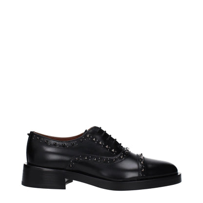 Low-Heel Derby Lace-Up Shoes by Valentino Garavani for unisex in leather black features an ergonomic silhouette, perfectly showcasing Unisex Leather Low-Heel Derby Lace-Up Shoes with its distinct 3-5-cm-heel low-heel and elegant round toe style.