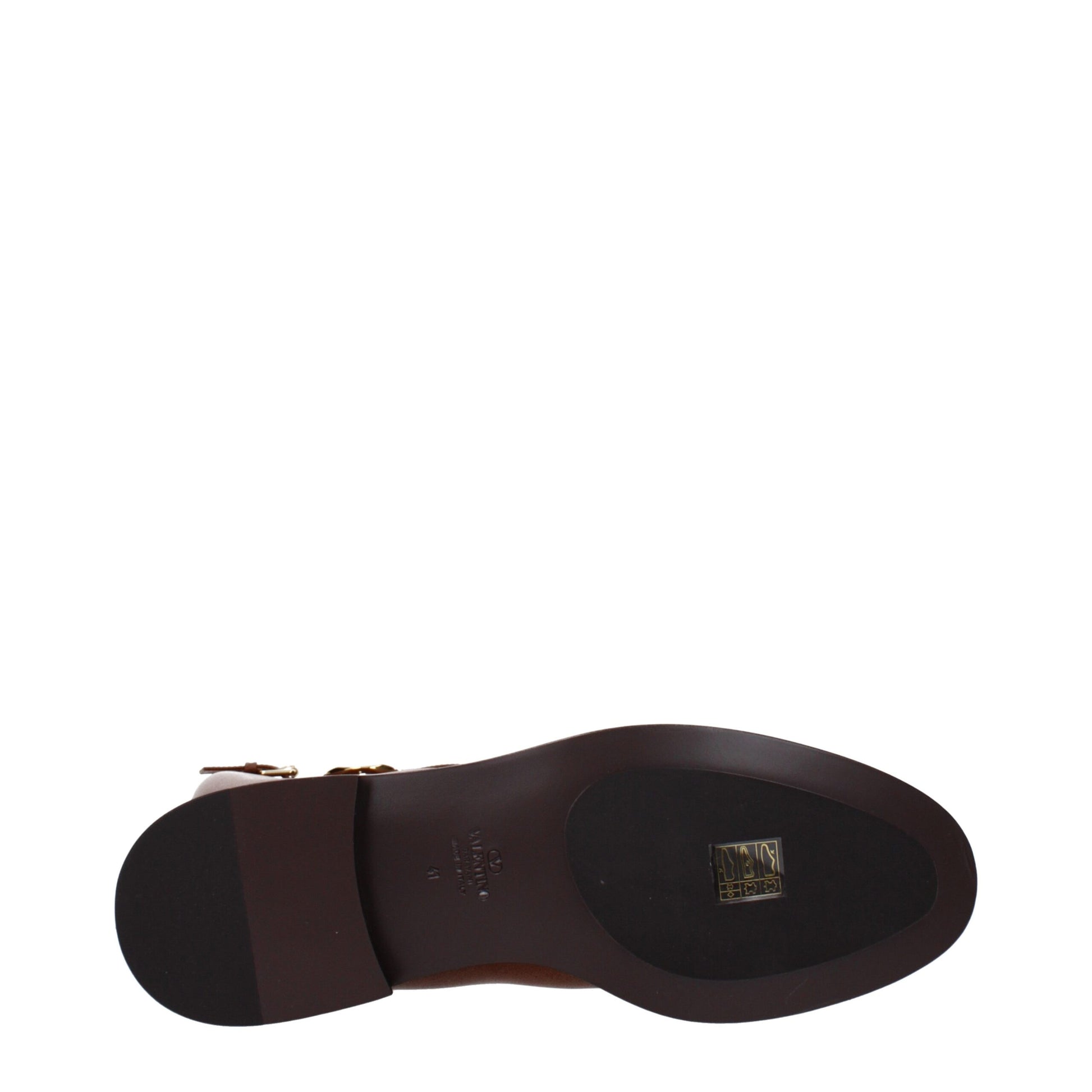 Flat Boots by Valentino Garavani for women in leather brown showcases a impeccable silhouette as Women's Leather Flat Boots, artfully defined by a impeccable flat and a impeccable round toe style.