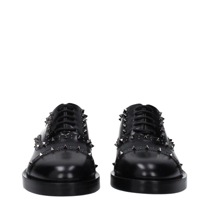 Low-Heel Derby Lace-Up Shoes by Valentino Garavani for unisex in leather black features an ergonomic silhouette, perfectly showcasing Unisex Leather Low-Heel Derby Lace-Up Shoes with its distinct 3-5-cm-heel low-heel and elegant round toe style.