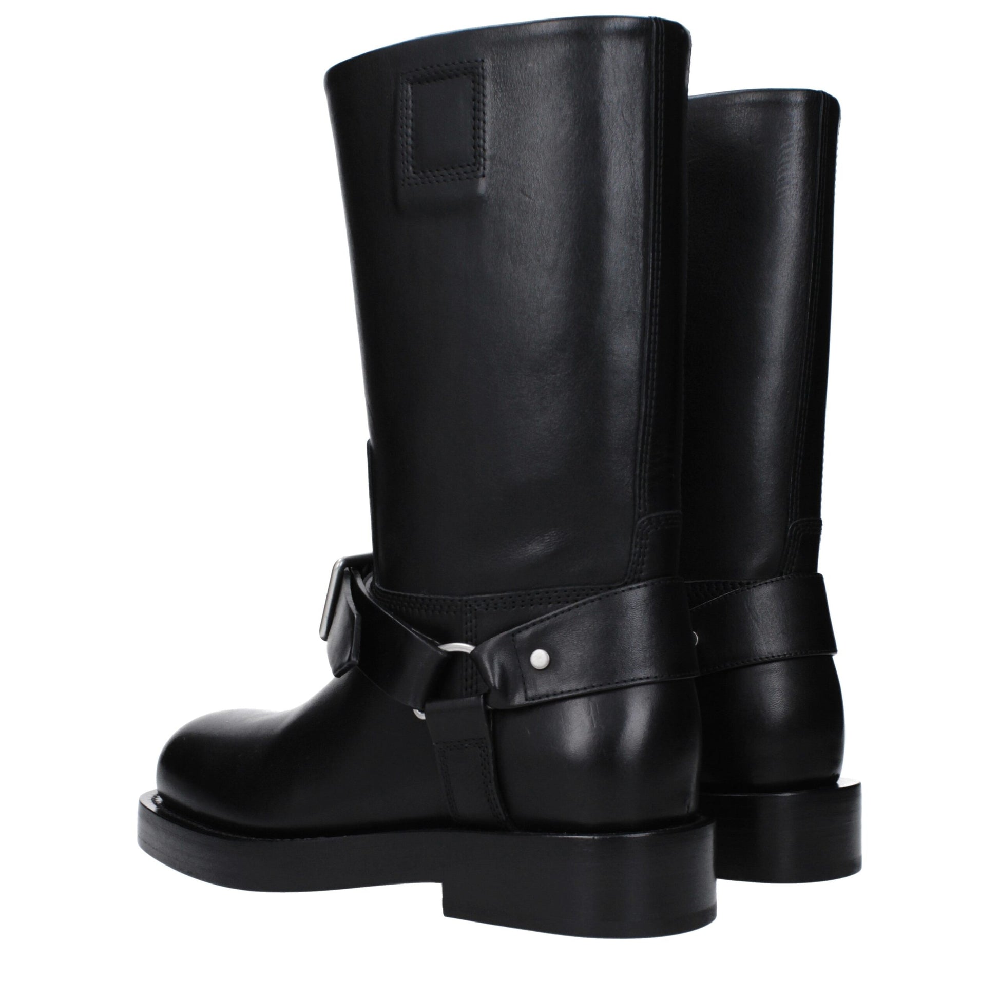 Low-Heel Boots by Burberry for women in leather black showcases a impeccable silhouette as Women's Leather Low-Heel Boots, artfully defined by a impeccable 3-5-cm-heel low-heel and a impeccable round toe style.