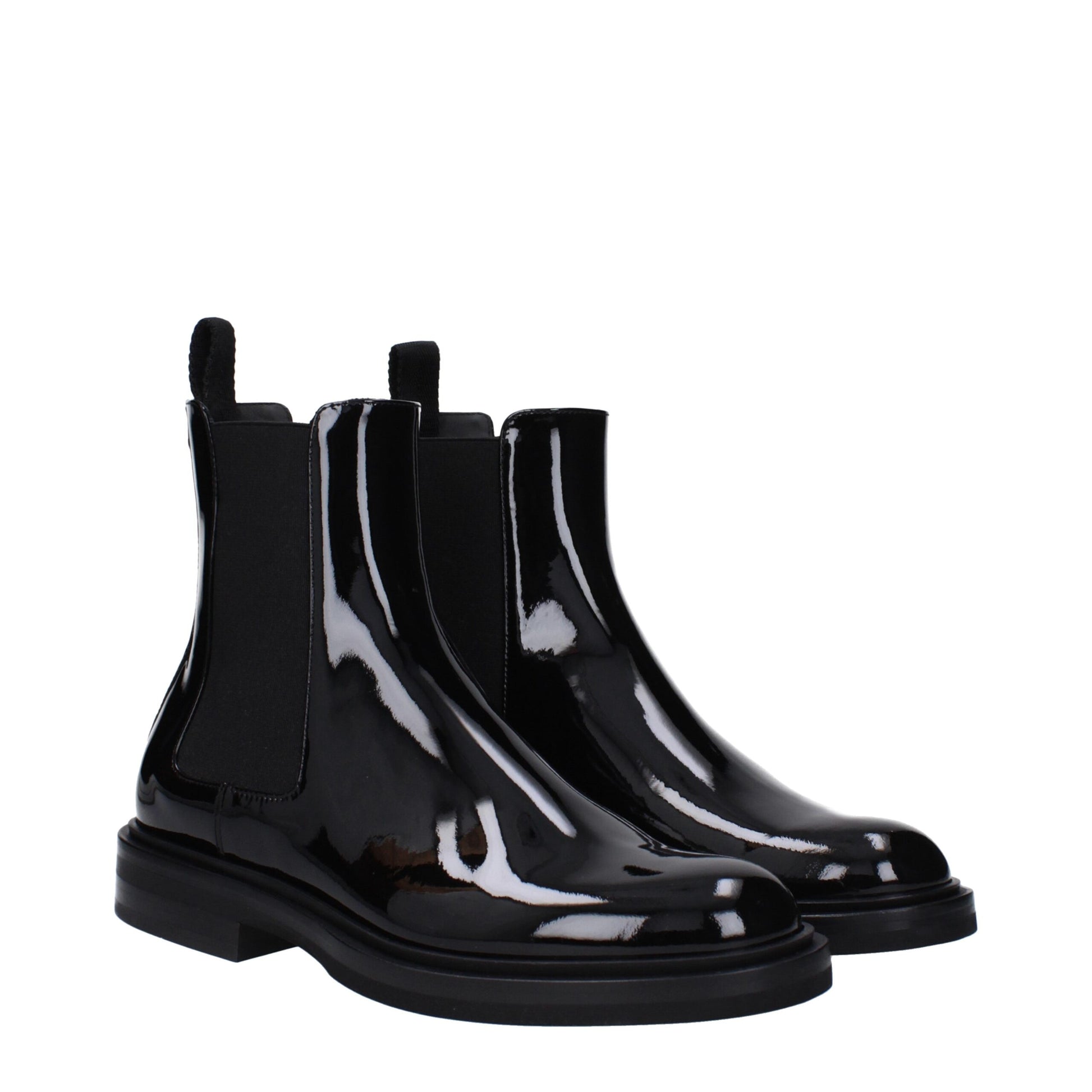 Flat Ankle Boots by Dolce & Gabbana for men in patent leather black & silver showcases a impeccable silhouette as Men's Patent Leather Flat Ankle Boots, artfully defined by a impeccable flat and a impeccable .