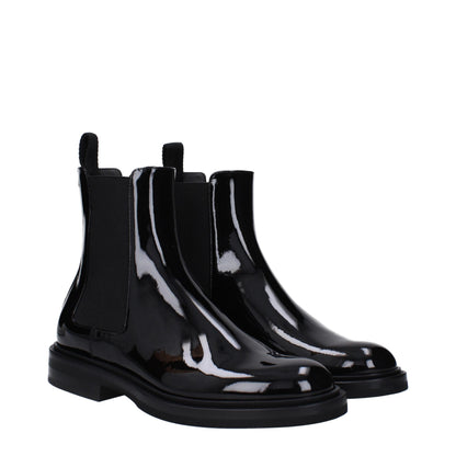 Flat Ankle Boots by Dolce & Gabbana for men in patent leather black & silver showcases a impeccable silhouette as Men's Patent Leather Flat Ankle Boots, artfully defined by a impeccable flat and a impeccable .