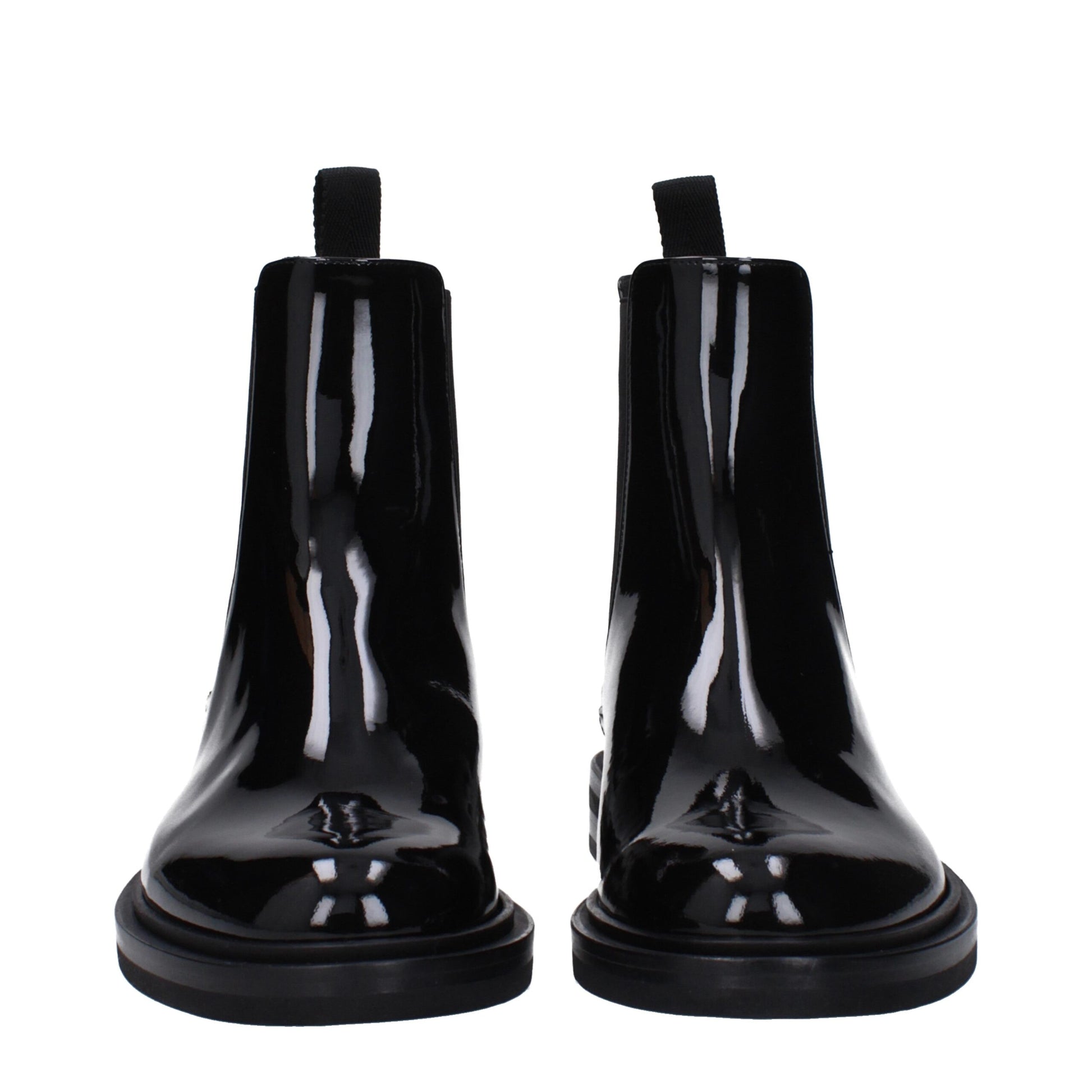 Flat Ankle Boots by Dolce & Gabbana for men in patent leather black & silver features an effortless chic silhouette from the Men's Patent Leather Flat Ankle Boots collection, showcasing a effortless chic flat and refined for an effortless chic look.