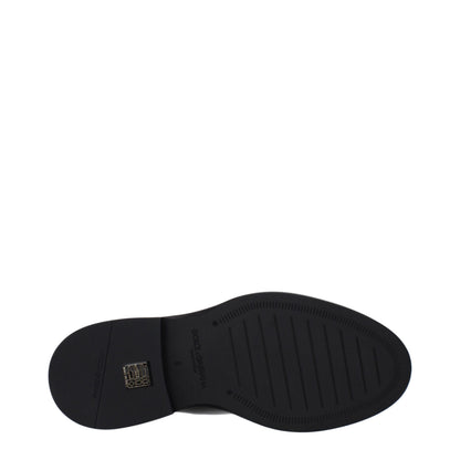 Flat Ankle Boots by Dolce & Gabbana for men in patent leather black & silver features an dynamic silhouette, showcasing the dynamic Men's Patent Leather Flat Ankle Boots design with its distinctive flat and elegant .