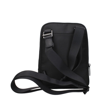 Small Crossbody Handbag by Piquadro for unisex in fabric black features a transformative elegance silhouette, showcasing a secure zipper, organized , and versatile crossbody-strap, shoulder-strap & adjustable-strap for a transformative elegance look.