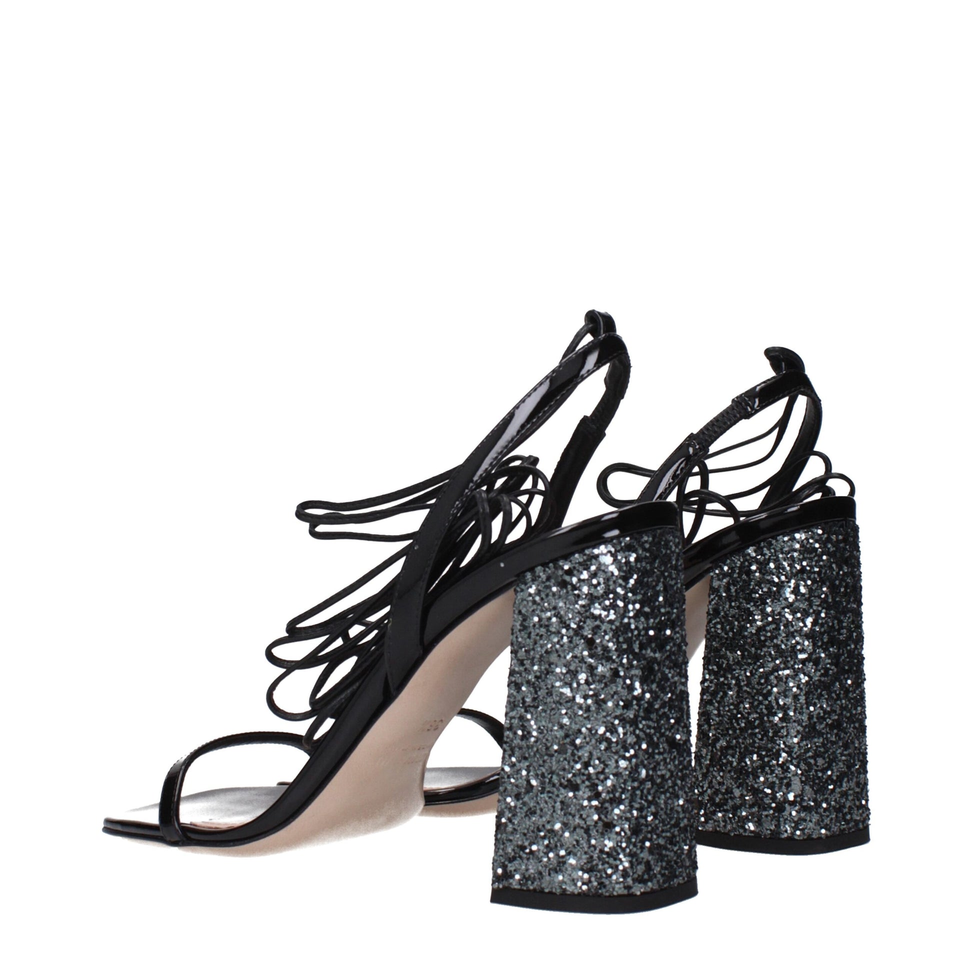 Sandals by Miu Miu for women in patent leather black features an architectural design from the Women's Patent Leather Sandals collection, defined by a architectural and open toe style for a architectural finish.