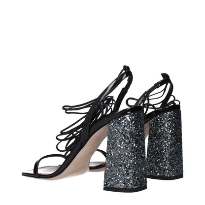 Sandals by Miu Miu for women in patent leather black features an architectural design from the Women's Patent Leather Sandals collection, defined by a architectural and open toe style for a architectural finish.