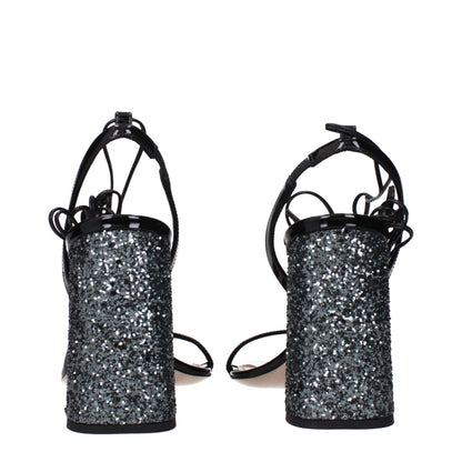 Sandals by Miu Miu for women in patent leather black showcases a sculptural silhouette as Women's Patent Leather Sandals, defined by a sculptural and sculptural open toe style for a sculptural look.