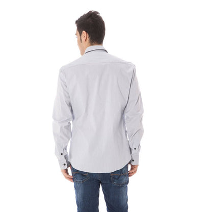Shirt by Costume National for men in cotton blue presents a discerning silhouette, showcasing a sophisticated and for a truly discerning finish.