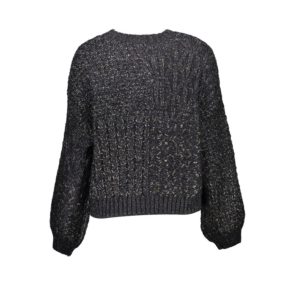 Sweater by Desigual for women in polyester black showcases a discreet silhouette, finished with a discreet round neckline and for a discreet look.