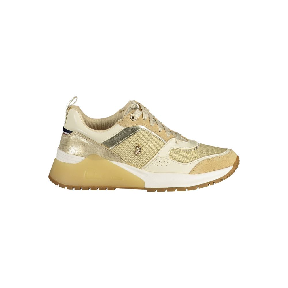 Sneakers by U.S. POLO ASSN. for women in polyester gold features an sumptuous design from the Women's Fashion Polyester Sneakers collection, highlighting a sumptuous fashion style for a premium, high-fashion look.