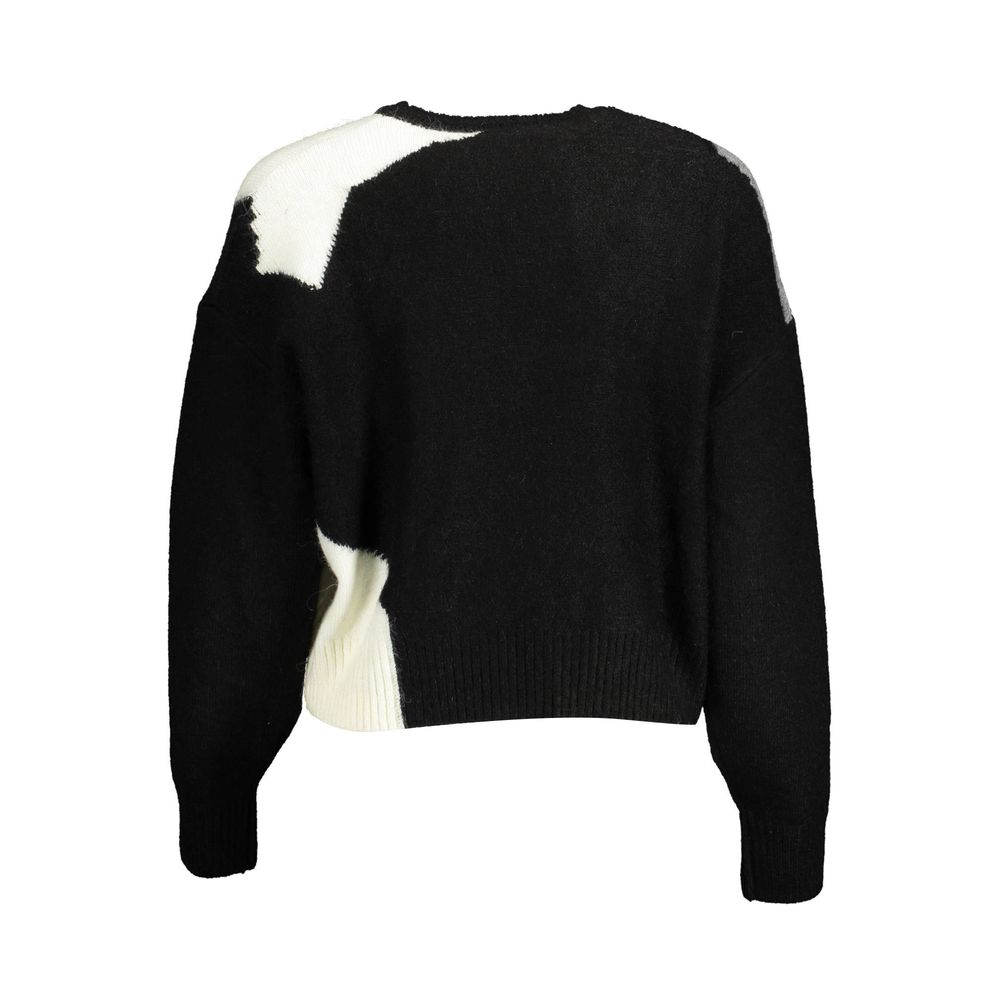 Sweater by Desigual for women in polyester black showcases an masterful silhouette, artfully detailed with a masterful and for a sophisticated, premium finish.