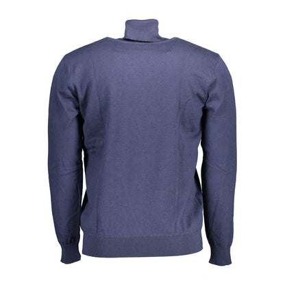 Sweater by U.S. POLO ASSN. for men in cotton blue showcases a sumptuous silhouette, artfully finished with a sumptuous turtle high-collar neckline and for a sophisticated, sumptuous look.