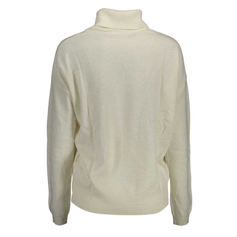Sweater by U.S. POLO ASSN. for women in wool white showcases an masterful silhouette, artfully detailed with a masterful turtle high-collar neckline and for a sophisticated, premium finish.