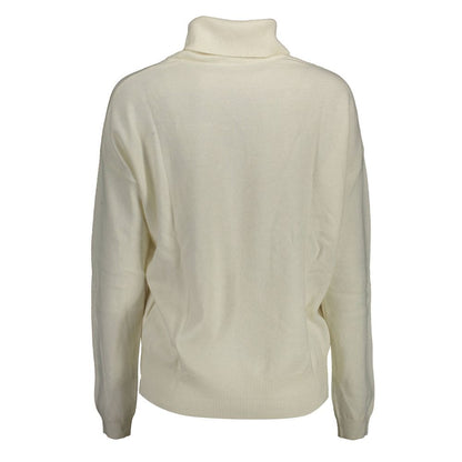 Sweater by U.S. POLO ASSN. for women in wool white showcases an masterful silhouette, artfully detailed with a masterful turtle high-collar neckline and for a sophisticated, premium finish.