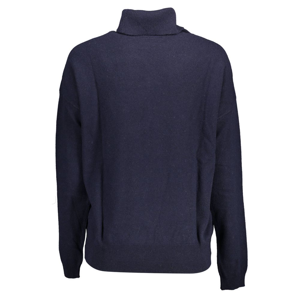 Sweater by U.S. POLO ASSN. for women in wool blue showcases an masterful silhouette, artfully detailed with a masterful turtle high-collar neckline and for a sophisticated, premium finish.