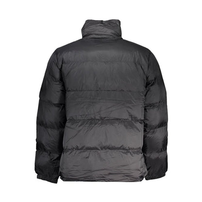 Jacket by Vans for men in polyester black showcases a enveloping silhouette, artfully detailed with a enveloping and premium pockets for a truly enveloping finish.