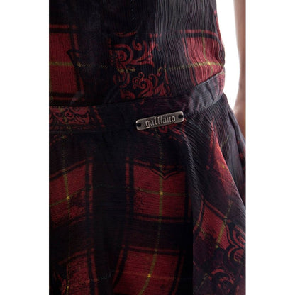 Skirt by John Galliano for women in silk black showcases a sultry silhouette, elegantly defined by its short and the sophisticated sultry design of the Women's Silk Skirt.