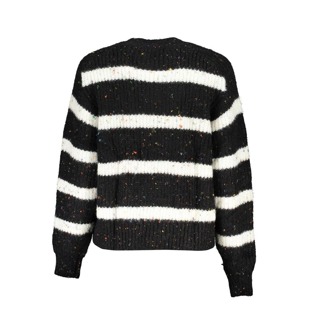 Sweater by Desigual for women in polyester black showcases a sumptuous silhouette, artfully finished with a sumptuous turtle neckline and for a sophisticated, sumptuous look.