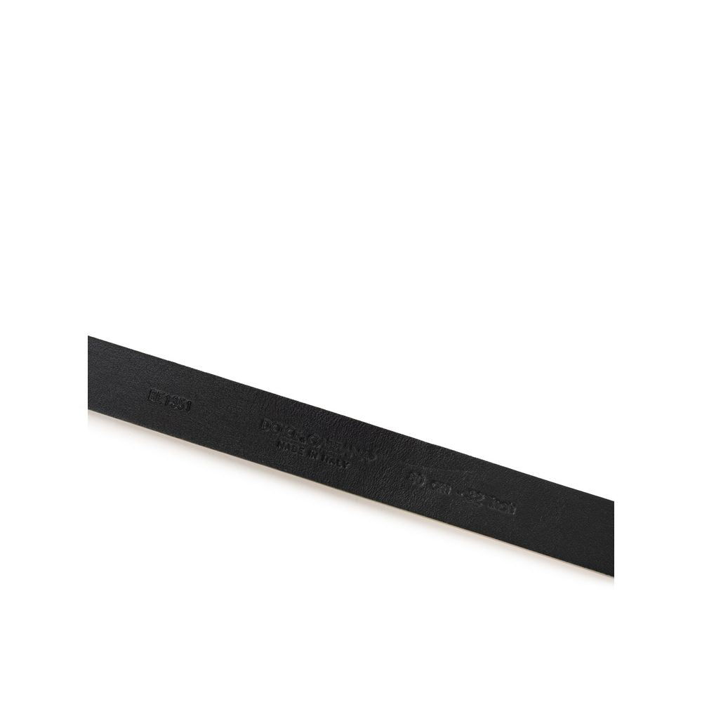 Belt by Dolce & Gabbana for women in leather black & gold features an artisanal finish, elegantly showcasing the signature style and artisanal craftsmanship of the Leather Belt design.