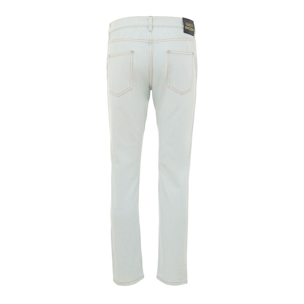Jeans by Gucci for men in cotton denim & leather gold & light-blue features a polished silhouette with a polished relaxed-fit, reaching a polished long and finished with a polished .